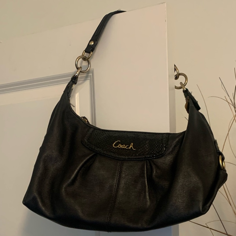Black medium sequined embossed with gold Coach logo on front